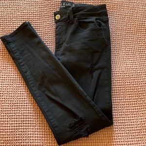 Black skinny jeans with holes
